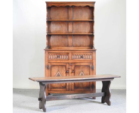 An old charm style oak dresser, together with a bench (2)92w x 45d x 174h cm dresser