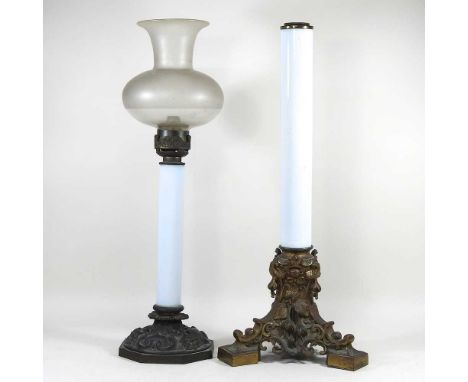 A Victorian candle lamp and shade, 57cm high overall, together with another (2)The larger base looks to be intact, but dirty 