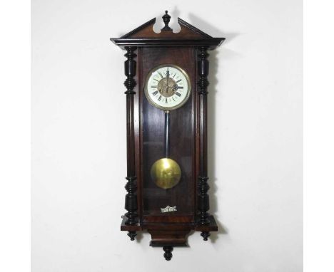 A 19th century Vienna style regulator clock, with an enamel dial, 120cm high
