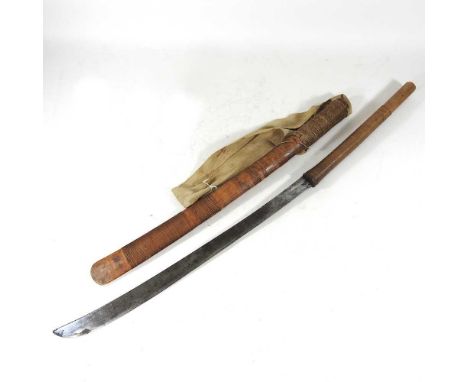 A Burmese Dha sword, probably late 19th century, having a curved steel blade and bound wooden grip, in a bound wooden scabbar