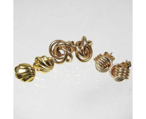 A pair of 9 carat gold stud earrings, of Celtic knot design, 3.1g, each 13mm wide, together with a pair smaller, 1.9g and a p