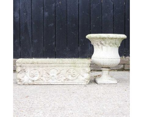 A cast stone garden trough, 72cm wide, together with a garden urn (2)