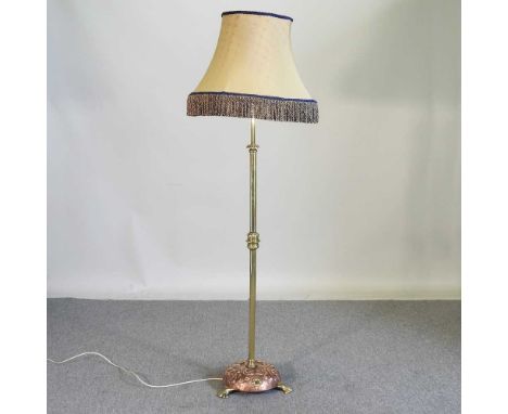 An Art Nouveau brass and copper standard lamp and shade, 170cm high