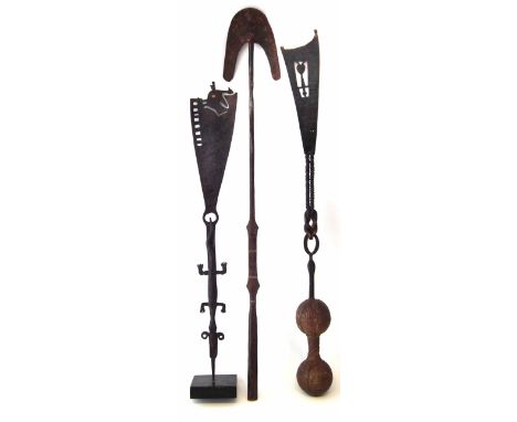 Three iron currency weapons, the largest measures 103cm high.     All lots in this Tribal and African Art Sale are sold subje