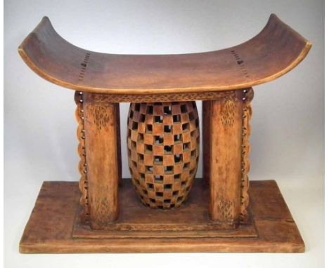 Ashanti stool, 74cm wide     All lots in this Tribal and African Art Sale are sold subject to V.A.T. Therefore £100 hammer pr