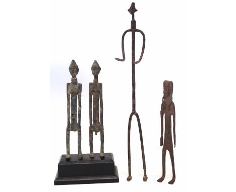 Bambara iron female figure together with a pair of metal figures and one other figure, (4) 48cm max height.       All lots in