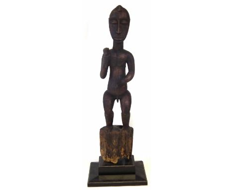 Dogon male figure, 73cm high    All lots in this Tribal and African Art Sale are sold subject to V.A.T. Therefore £100 hammer