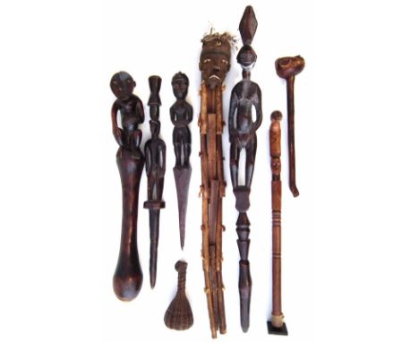 Collection of items, to include a Mambila pestle, Bembe staff, Pende divination instrument, four other staffs and a rattle, t