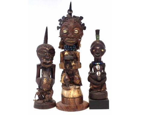 Three Songye Mankishi Power figure or Fetishes, the tallest measures 45cm high.     All lots in this Tribal and African Art S