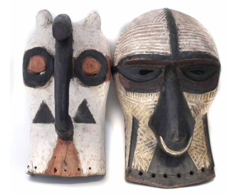 Two Songye Kifwebe masks carved with animal features, the largest measures 42cm high     All lots in this Tribal and African 