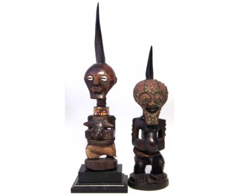 Two Songye Nkisi Power figures or Fetishes, the tallest measures 54cm high including the base.      All lots in this Tribal a