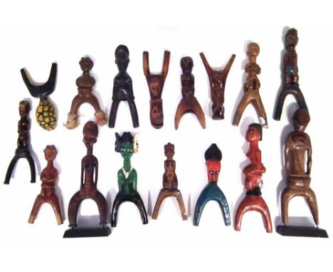 Sixteen slingshots carved in various tribal styles, the largest measures 26cm high    All lots in this Tribal and African Art