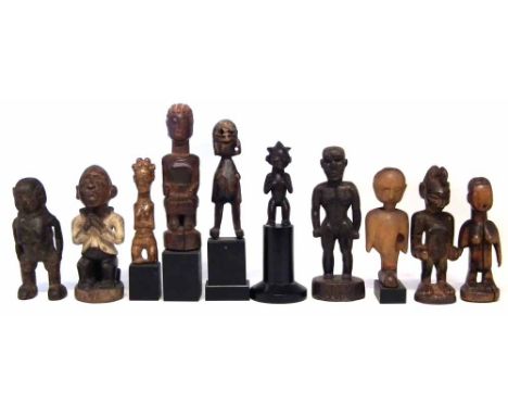 Ten African figures carved in various tribal styles, the largest measures 20cm high     All lots in this Tribal and African A