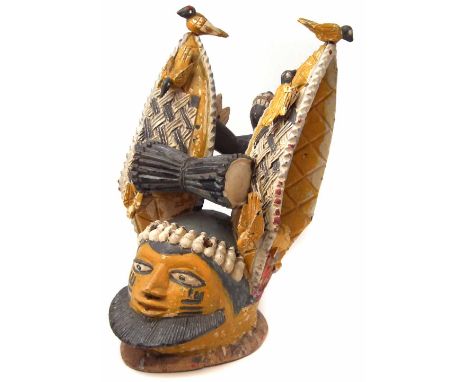 Yoruba Egungun Rabbit helmet mask, 54cm high     All lots in this Tribal and African Art Sale are sold subject to V.A.T. Ther