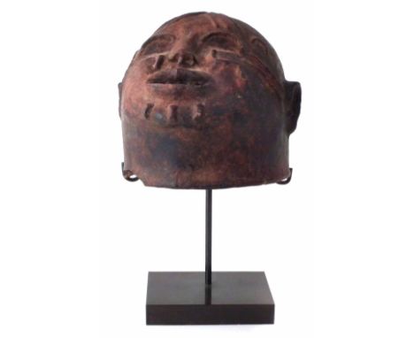 Makonde helmet mask, terracotta or pottery, 18cm high     All lots in this Tribal and African Art Sale are sold subject to V.