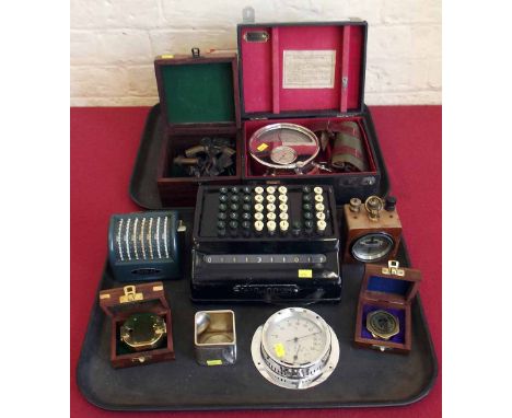 Collection of scientific instruments, calculators and reproduction ships navigation instruments, also a "cube teapot company"