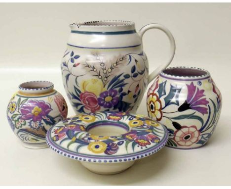 Three Poole vases and a jug. Condition report: see terms and conditions