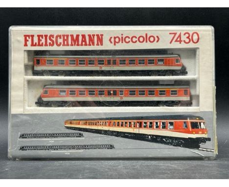 Fleischmann 7430 Class BR 614 2-Car Diesel Railcar of the DB in Orange & Grey - Tested Non Runner(300g) Condition: Railcar - 
