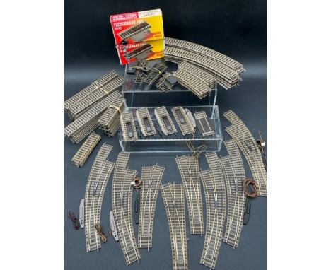 Over 70 items of Fleischmann HO gauge track, including 8 turn-outs(2400g)Good condition with few tarnishedImages show quantit