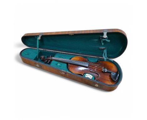 A cased violin, label to interior reads ‘Dulcis et Fortis’, back 36cm.  Condition - scratches