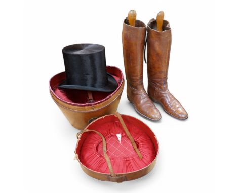 A pair of vintage leather riding boots and a leather cased top hat, ‘A.J. White, hatter to the Royal Family’. Condition - fai