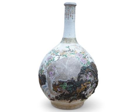 A Japanese earthenware "monkey and crabs" bottle vase, Meiji period, unsigned, manner of Makuzu Kozan, 39cm. Condition- fair 