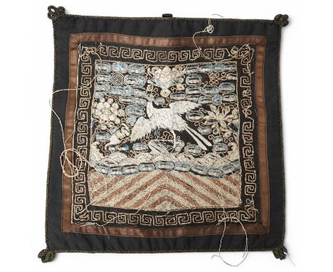 A Chinese 20th century silk embroidered Phoenix rank badge with border, 25cm x 26cm. Condition - embroidery worn in places wi
