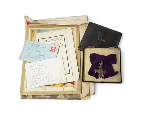 A civilian OBE with ladies bow ribbon, hallmarked for London 1929 in a Garrard’s fitted case, together with a small collectio