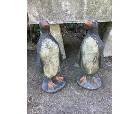 A pair of cast penguin garden ornaments, height 65cm. Condition - fair