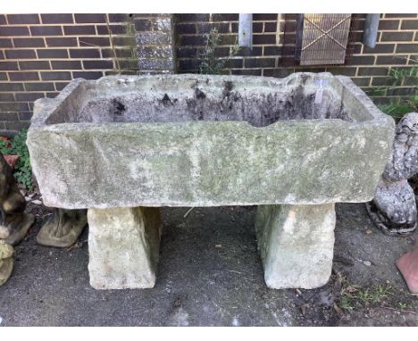 A stone trough, width 122cm, depth 60cm, height 84cm. Condition - fair