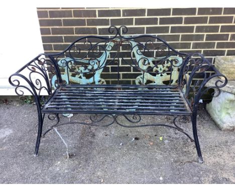 A metal garden bench, width 130cm, depth 45cm, height 87cm together with a pair of bench ends. Condition - fair