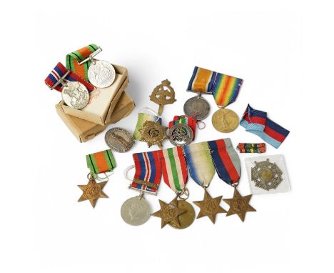 Nine military medals including; a First World War medal pair to T3-026887 DVR. C. Oldfield. A.S.C., a WWII group comprising; 