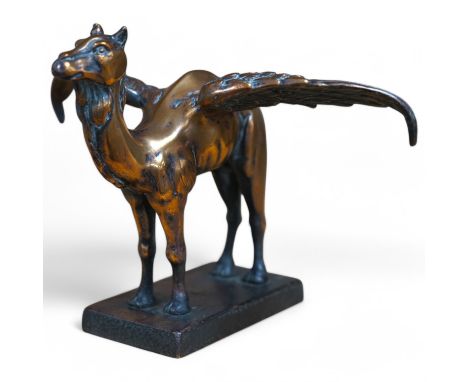 A bronze Royal Air Force 45th Squadron winged camel desk ornament, stamped Reg.746774 to the base, the emblem was introduced 