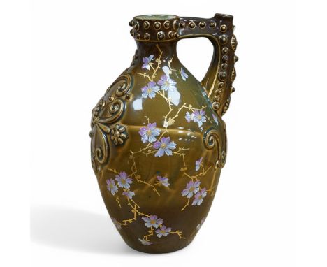 A large Zsolnay brown bodied ewer, with gilt decoration, 33cm high. Condition - good