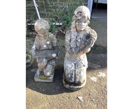 Two reconstituted stone garden ornaments, larger height 60cm. Condition - fair Chips and losses consistent with age and weath