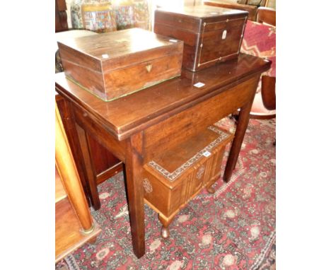 19th c. mahogany foldover card table on square legs with inside chamfer