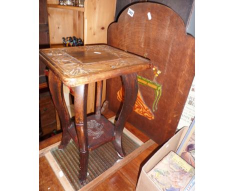 1930s Art Deco wooden firescreen with applied relief decoration of a lady at hew dressing table, a glass washboard, and a sma