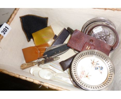 Box of assorted penknives, mother-of-pearl spoons and rings, coasters, a cut-throat razor etc