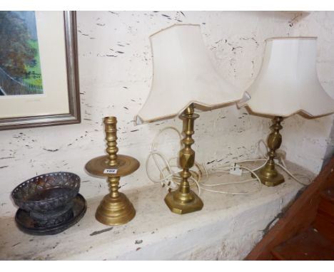 Brass 'drip' candlestick, and two brass table lamps