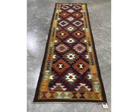 A Maimana Kilim carpet runner. 2.95m x 0.86m.