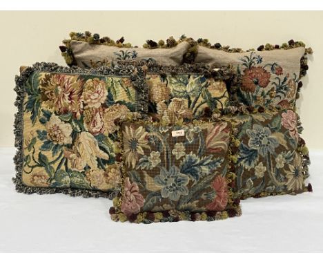 Six tapestry and velvet cushions