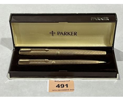 A cased Parker 9ct fountain pen and ballpoint pen en-suite.