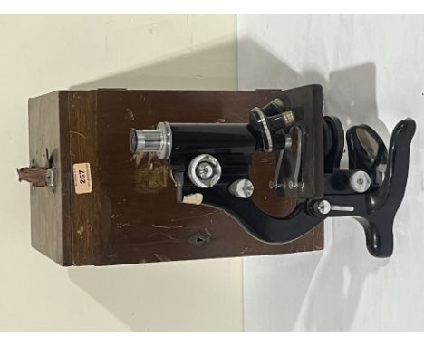 A cased monocular "Service" microscope by W.Watson + Sons, London.