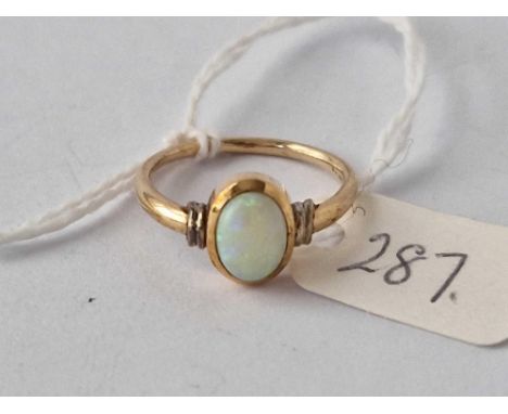 An Opal Ring, 9Ct, Size Q, 2.7 G.