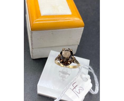 A Large Smokey Quartz Oval Ring 9Ct 2.7 Gms Boxed