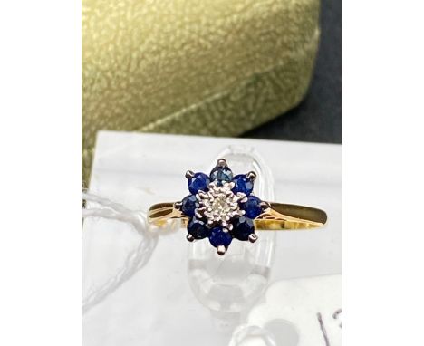 A Diamond And Sapphire Cluster Ring 18Ct Gold Size O 2.4 Gms Boxed