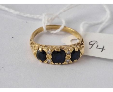 A Seven Stone Sapphire And Diamond Ring 18Ct Gold Size M 4.4 Gms