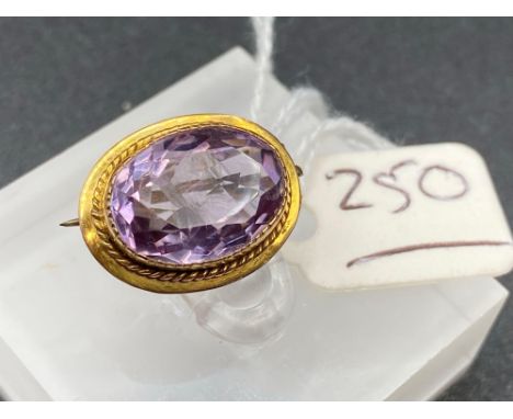 A Victorian Amethyst Brooch With Rope Twist Design 15Ct Gold