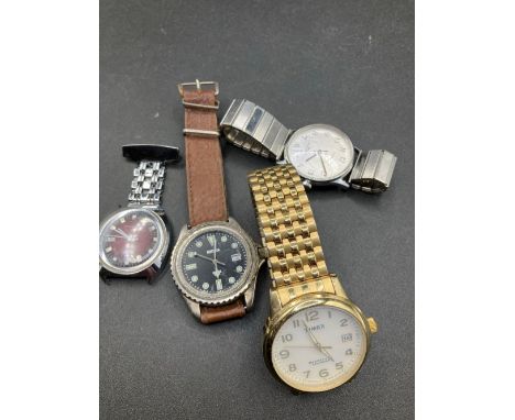 Three Timex Wrist Watches And One Other