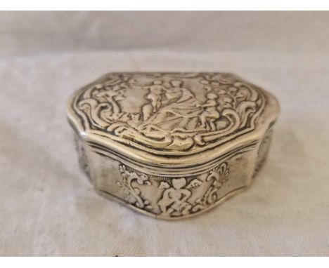 A Continental Shaped Oval Snuff Box Hinged Body Chased With Figures, 2.5 Inches Wide